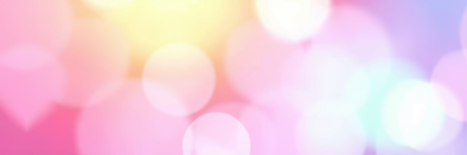 Colorful bokeh lights create a dreamy atmosphere in an abstract background during a festive event